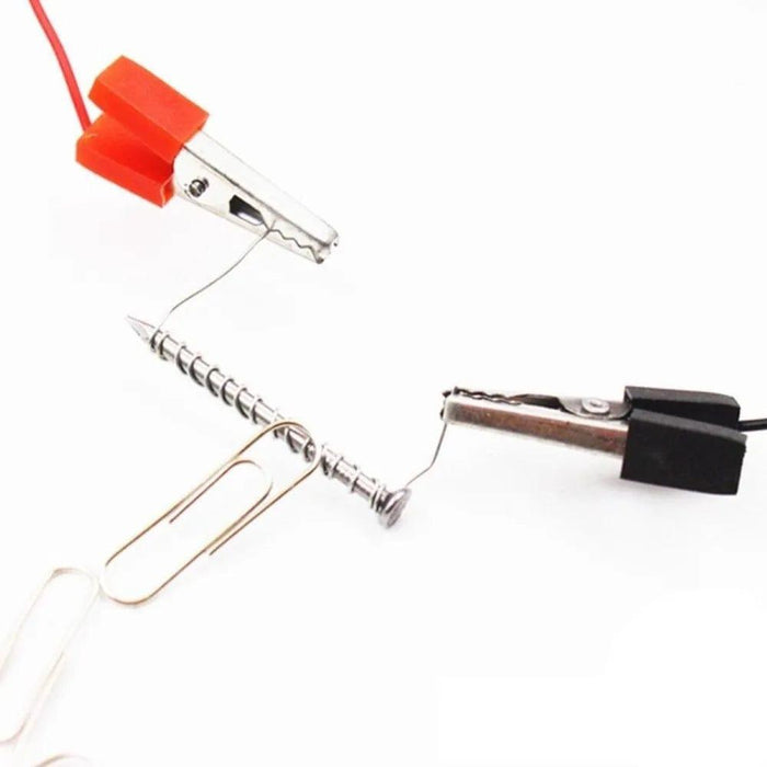 Electrodes with wires and clips on a white background