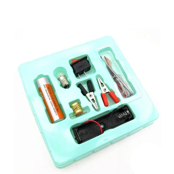 Set of electronic components and tools in a clear plastic case on a white background