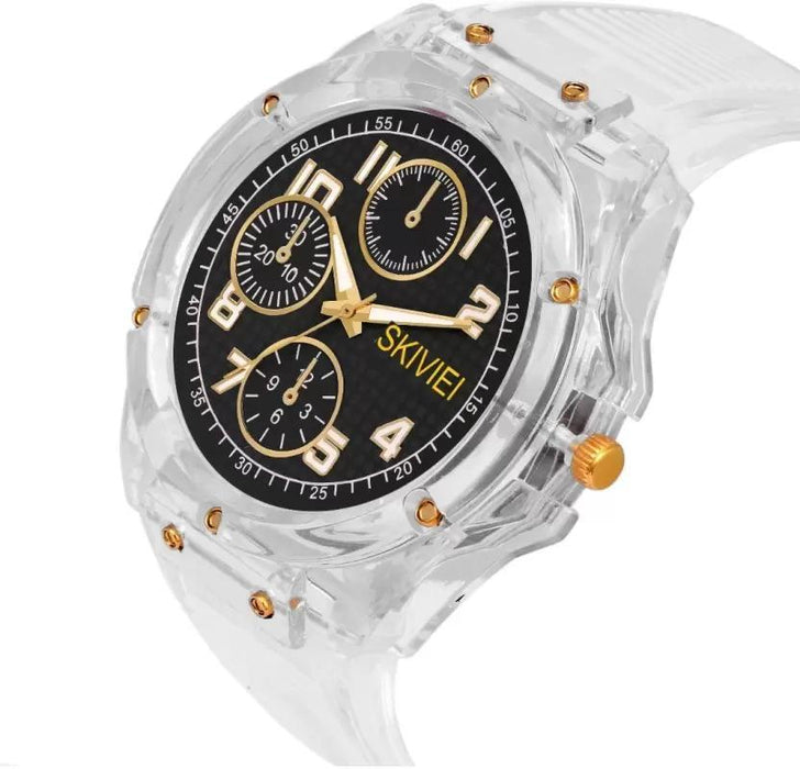 Clear wristwatch with black dial and gold accents on a white background
