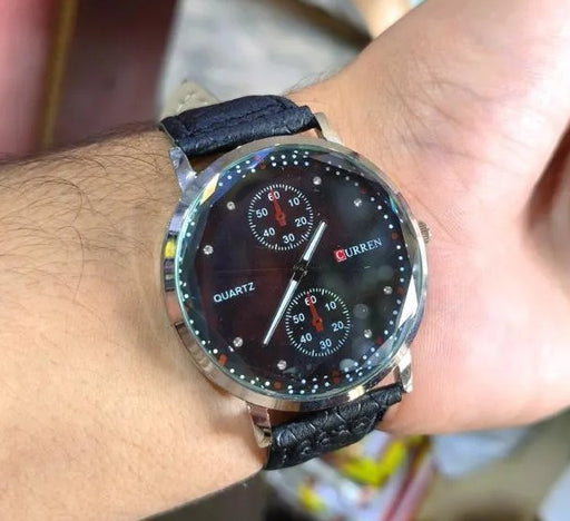 Current watch on a wrist with a blurred background