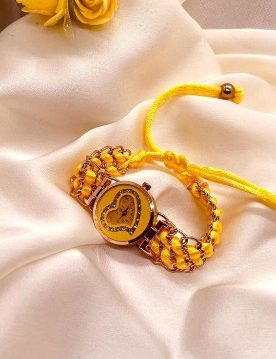 Yellow bracelet with heart design on a white fabric background