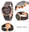 Emporio Armani watch with black and rose gold band on a white background