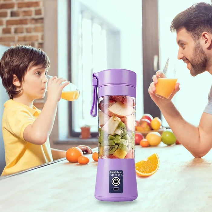 Two people drinking orange juice from a purple portable blender filled with fruits in a kitchen setting.