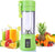 Green portable blender with fruits and drinks on a white background