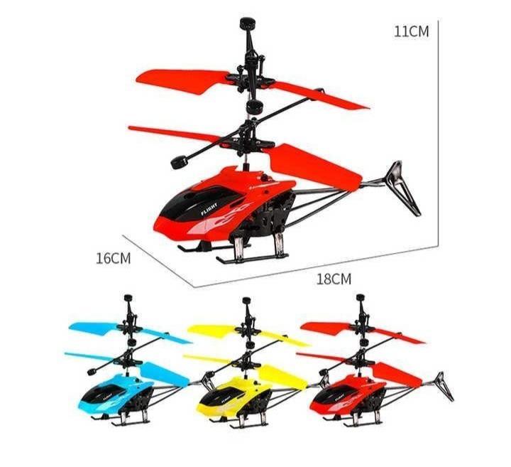 Red toy helicopter with dimensions on a white background
