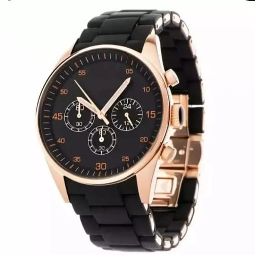 Watch with black strap and rose gold case on a white background