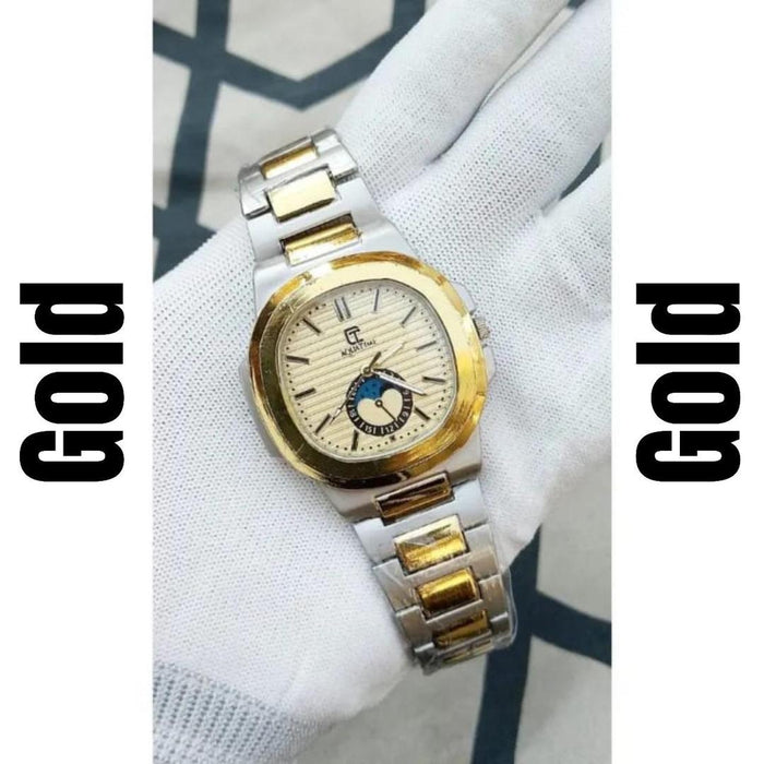 Gold and silver watch on a white background with 'Gold' text on either side.