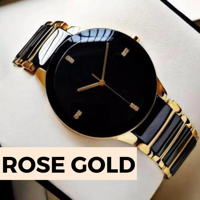 Rose gold watch with black face on a white background