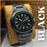 Black wristwatch on a brown cushion with 'BLACK' text overlay