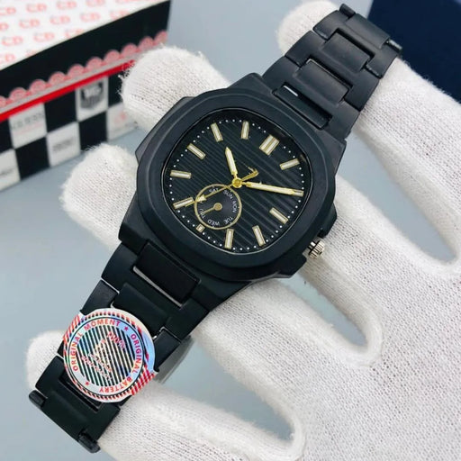 Black watch with gold accents on a white glove