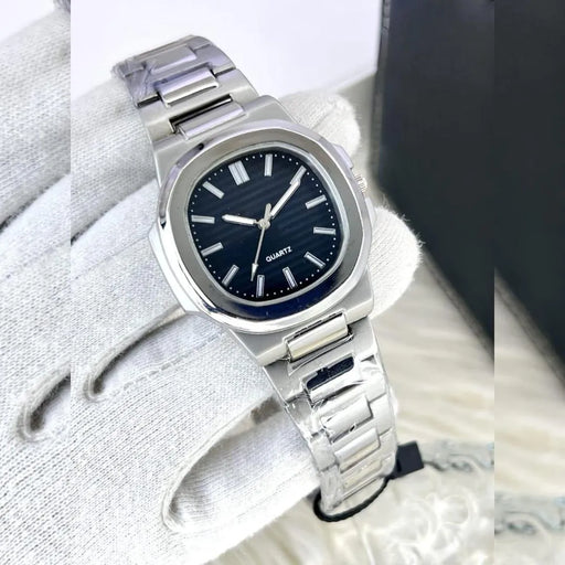 Silver watch with a black face on a white background