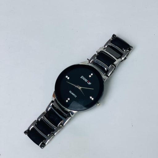 Black watch with a metal strap on a white background