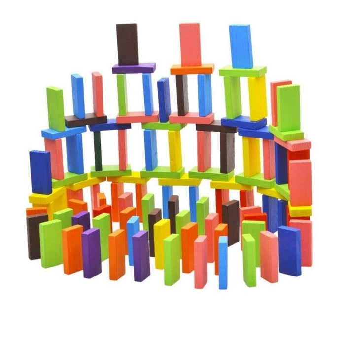 Colorful wooden blocks stacked into a tower on a white background