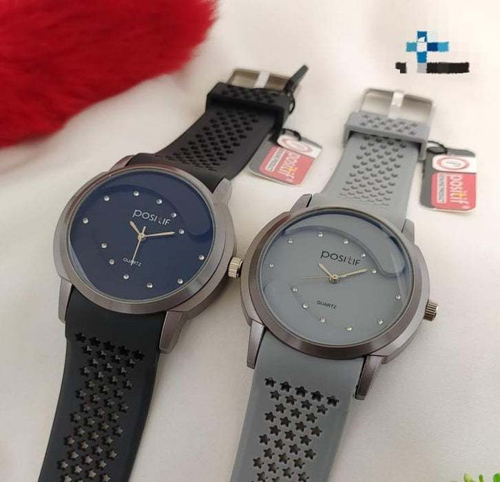 Two watches with star-patterned straps on a white background, featuring the brand 'POSITUR'.