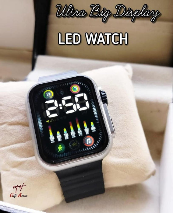 Digital LED watch with a black strap on a white cushion, labeled 'Ultra Big Display LED WATCH'.