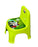 Green children's stool with cartoon design on a concrete floor.
